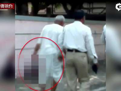 [视频]怀疑妻子女婿有染 印度男子将妻子斩首提头上街